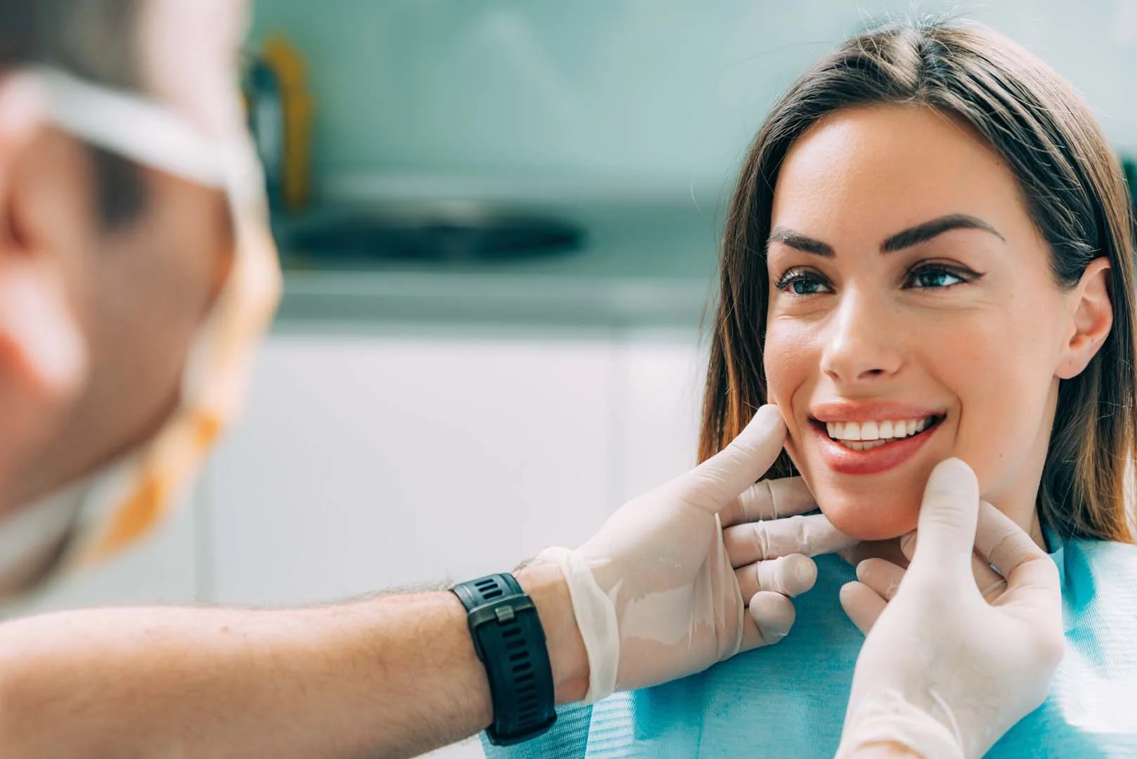 Patient showing confident smile after cosmetic dentistry